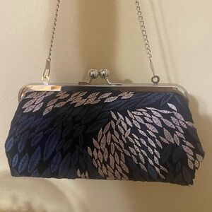 Champagne Navy clutch purse. Like new. Used for 6 hours for a wedding!
